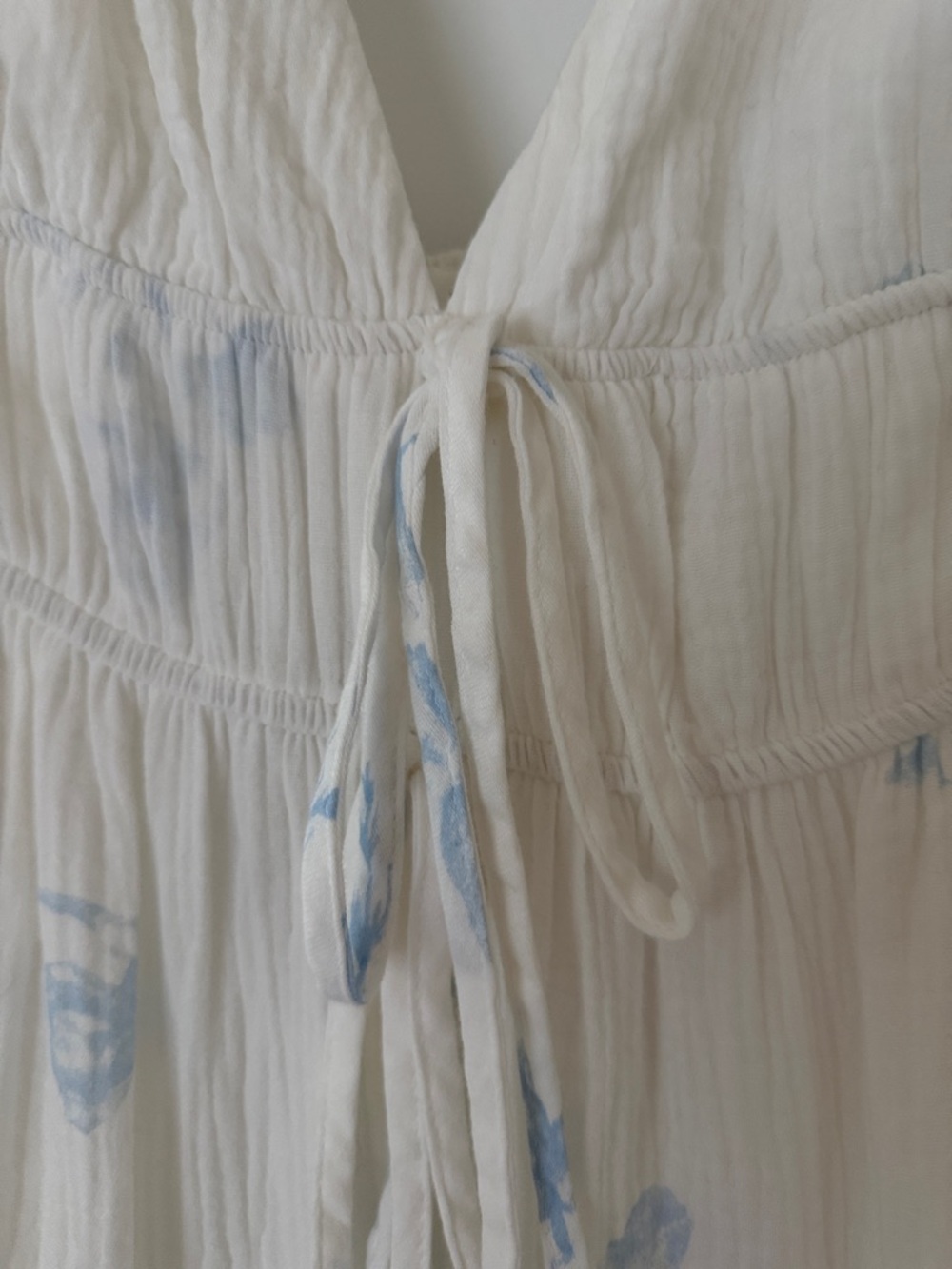 White Maxi Dress with Light Blue Floral Accent and Pockets - Picture 3 of 6